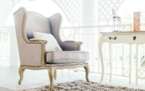 Beautiful luxury Pillow on sofa decoration in living room interior - Vintage light Filter